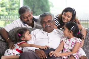Portrait of multi generations Indian family at home. Asian people living lifestyle.