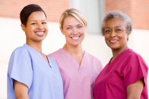 Nurses Standing Outside A Hospital